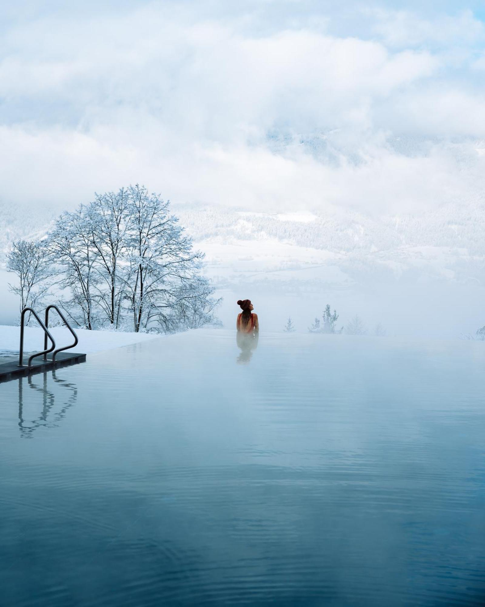 Santre Dolomythic Home Bressanone Luaran gambar A woman bathing in a hot spring